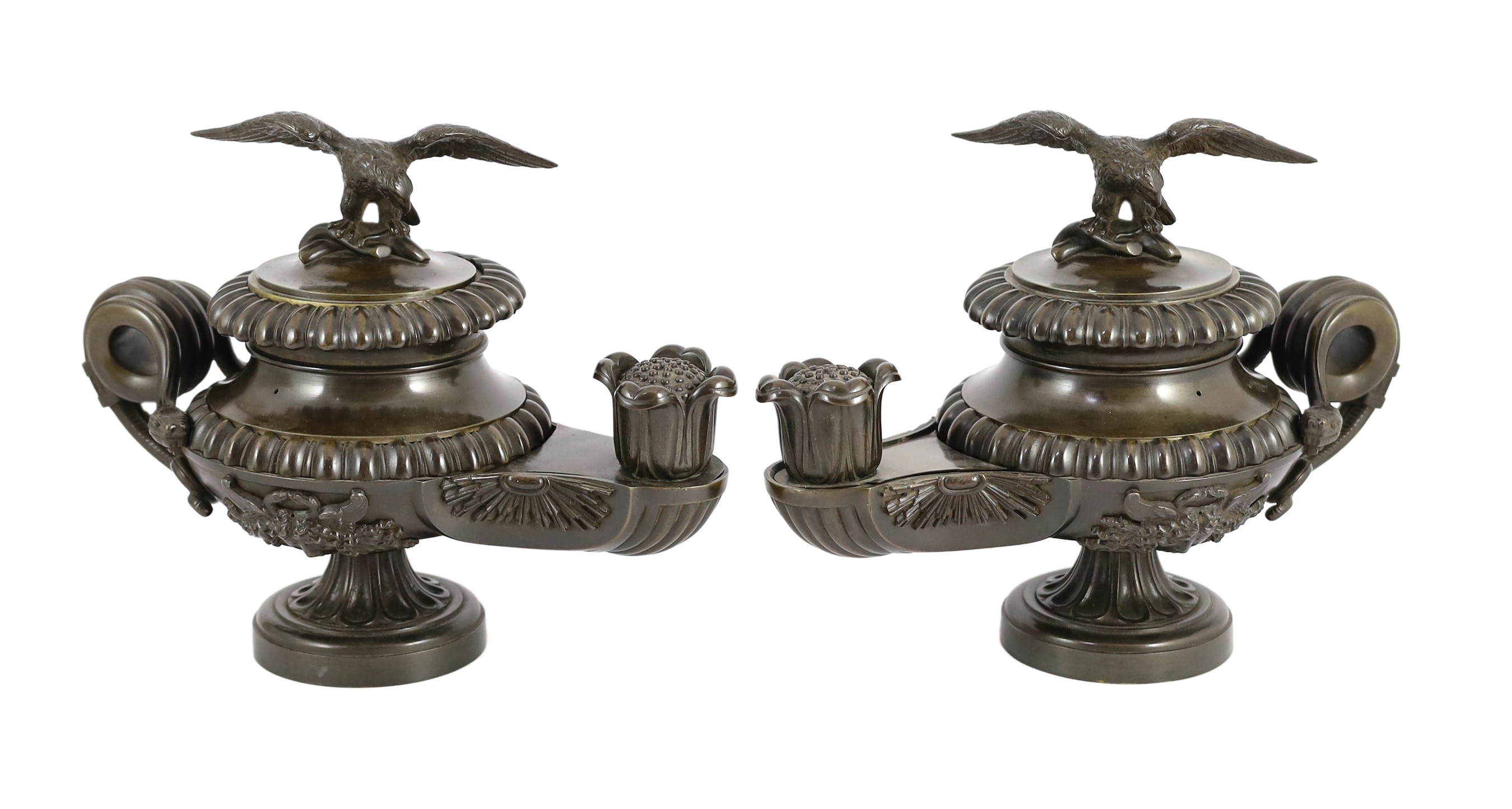 James De Ville, 367 Strand, London. A pair of Regency bronze oil lamps to a design by Thomas Hope, length 31cm depth 16cm height 25cm